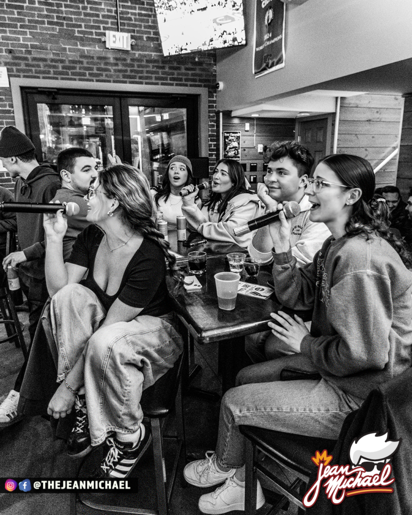 Guests at Karaoke with DJDeelish Deanna Larson hosting at Friar Tuck's in Mystic, Connecticut during winter Wednesdays.